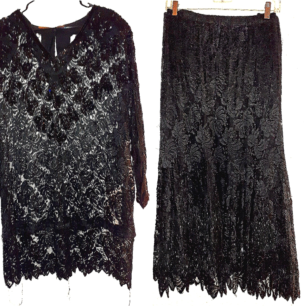 Matching black top and skirt